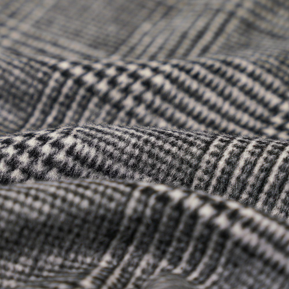 30 % ull, 60 % polyester, 10 % andre fibre, 610G/M, svart og hvitt, rutete overbeleggsstoff med enkelt ansikt, ML-20001